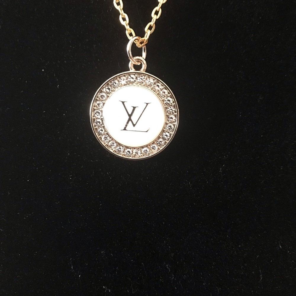 Louis Vuitton white withCrystals designer charm for 22mm w/ chain very beautiful